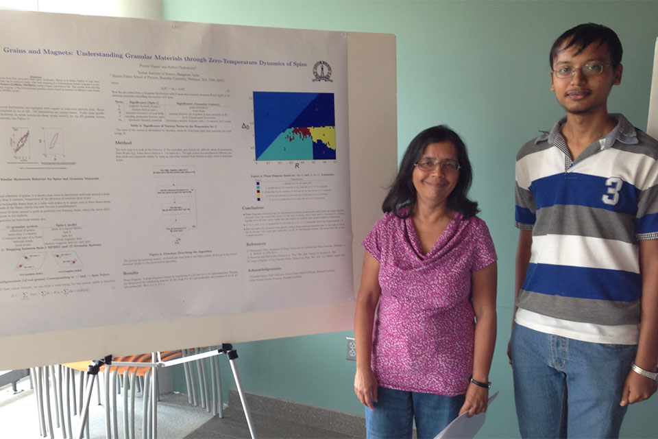 Students present a their research at a poster session