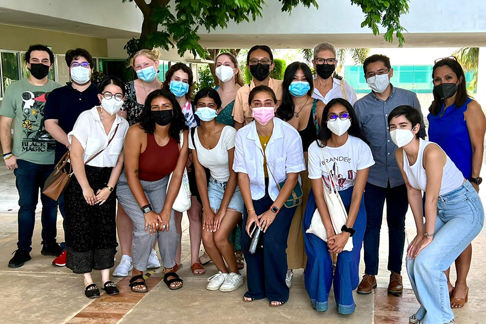 students in masks posing together