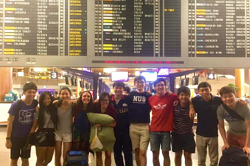 Stephanie Weinstein and friends wait at a train station