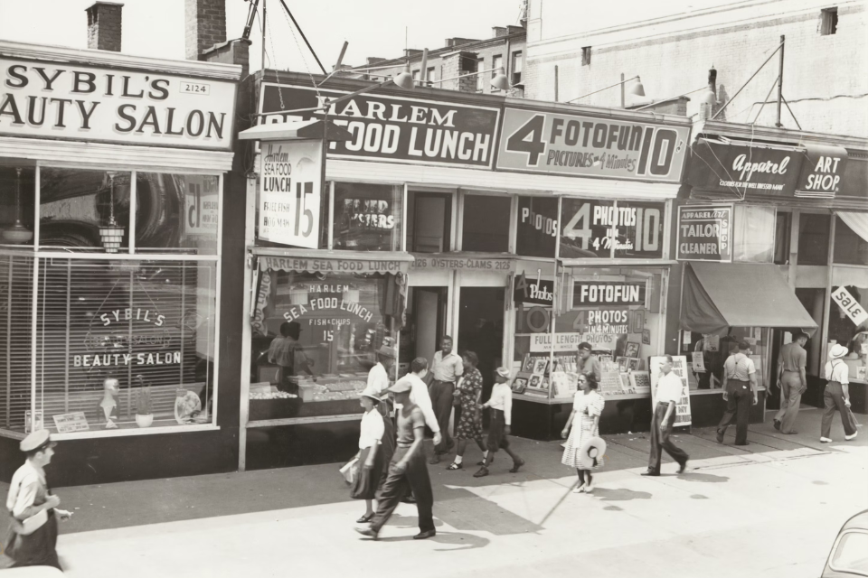 View of Harlem storefronts, 1939.