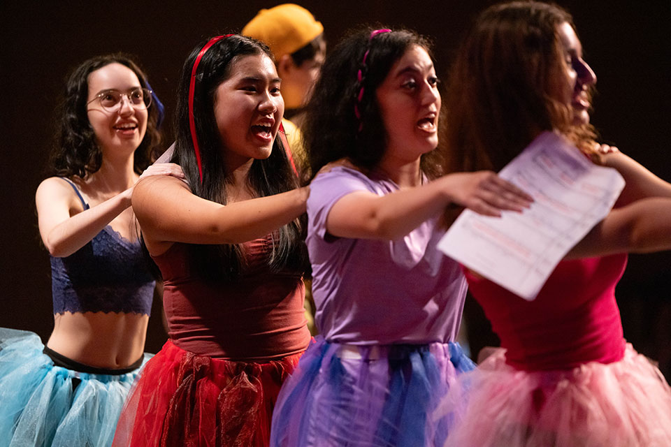 Students dance in a line during Brandeis' 24 hour musical.