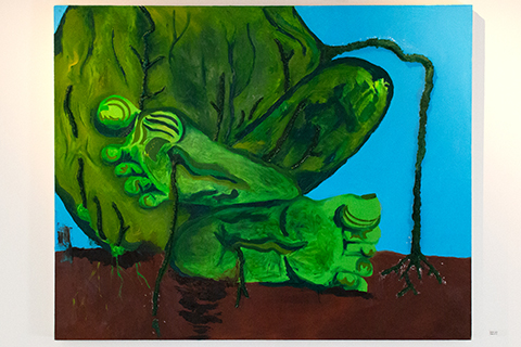 A two-foot tall by three-foot wide painting of a cropped green body lump. The body form has feet that are front and center in the composition. The fleshy layers of the lumped body are accentuated by being in relief. The relief sections read both as flesh wrinkles and vine-like organic matter that spreads throughout the surface of the painting and takes root in the ground.