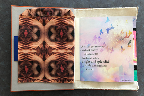 The back of Freiberg’s page is the same human abstracted pattern and is indeed two sheets stitched together. The page’s volume alongside the human pattern, folds, and stitching help accentuate the fleshy appearance.  The fourth page is artist Bekah Richards. The page looks to be a photoshopped image. The imagery is dreamlike with light pastel colors. Birds are flying around a large flower that emanates light. It has text that reads, “A change emerges a radiant clarity A lush garden fresh and subtle bright and splendid made unmistakable a dance.” By Bekah Richards
