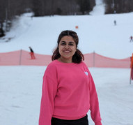 Akanksha in a pink sweater