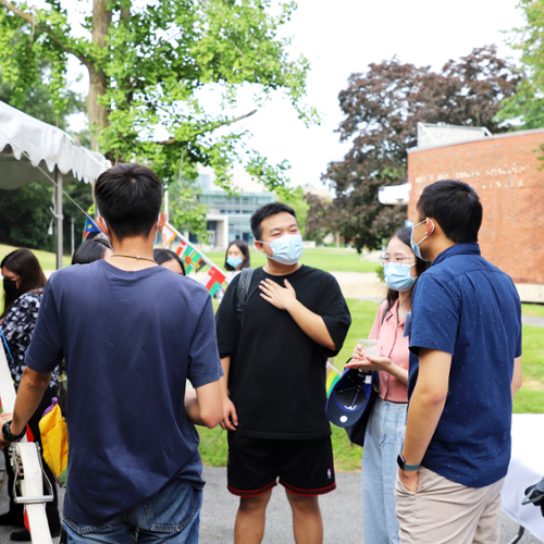 Students introduce themselves at an outside orientation event.