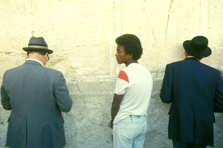 Two men and a boy at the Wailing Wall