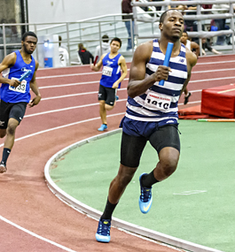 BACK IN FRONT:  Mohamed Sidique ‘15  (foreground) has overcome obstacles that would have sidelined most competitors.