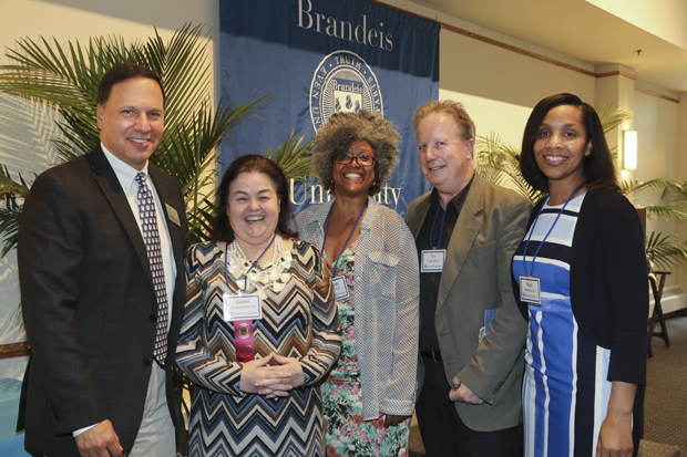 From Left to right: Brandeis President Ron Liebowitz,, Gwenn Smaxwill PhD ’04, Taneeta Bacon P ’06, Tim O’Neil, vice president of human resources Robin Nelson Bailey