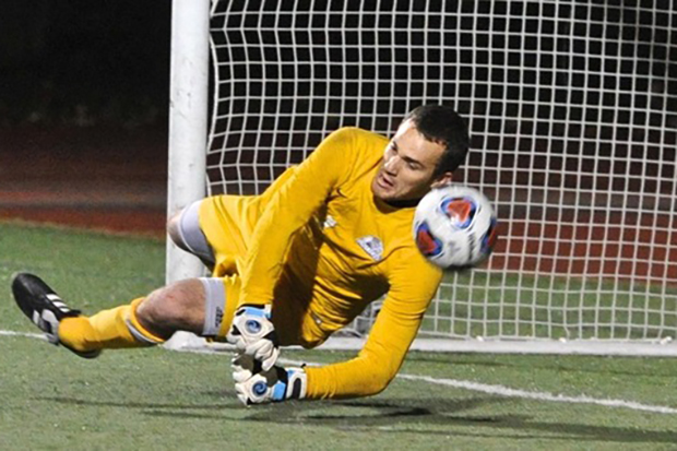 ben woodhouse making a save for brandeis