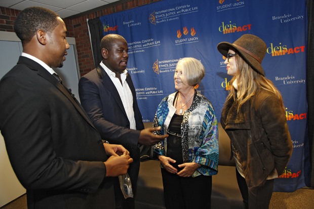 Nelson Mandela's grandchildren speaking with actress Eliza Dushku at a Brandeis event