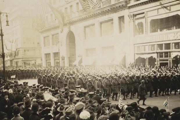 369th infantry marches up fifth avenue in a victory parade in 1919.