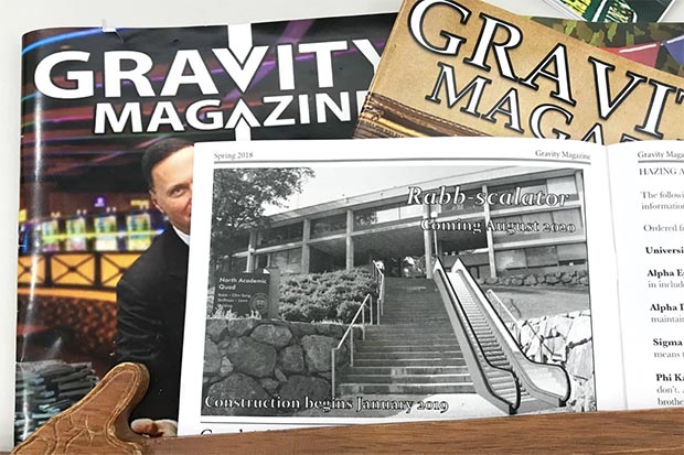 A pile of past editions of the Gravity magazine.