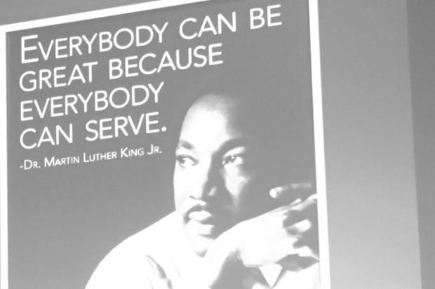Martin Luther King Jr. with a quote about community service