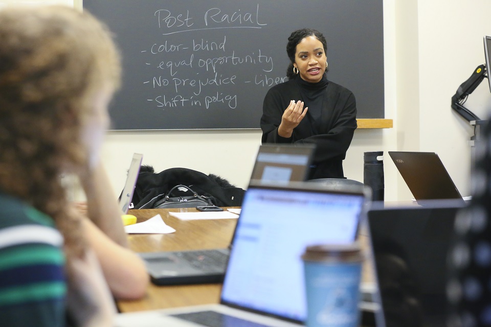 Professor Amber Spry teaching in a classroom