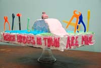 "I know which bridges in town are mine" cake