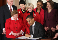 President Obama signs the Lilly Ledbetter Fair Pay Act