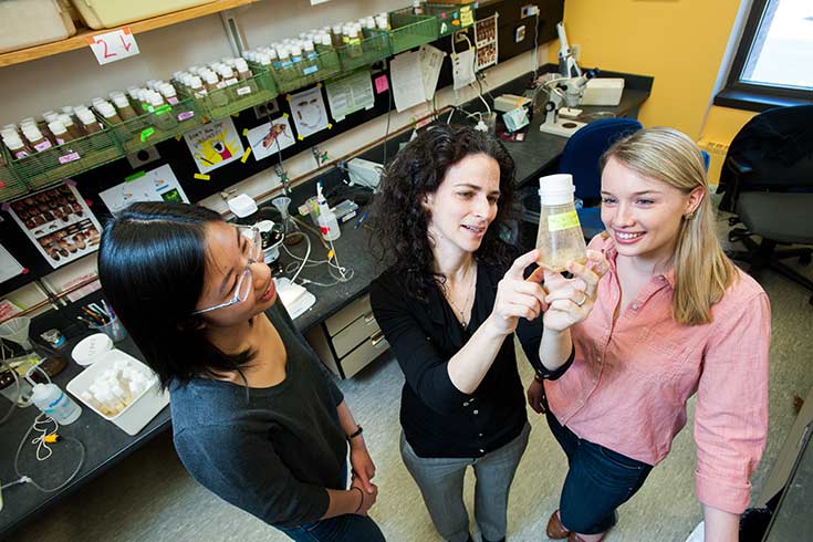Avital Rodal in lab with student researchers