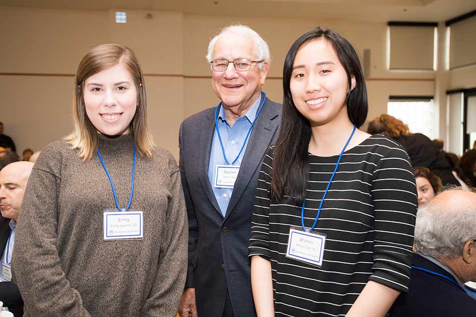 Students and Trustee at an event