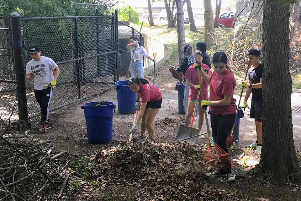 Students doing yard work