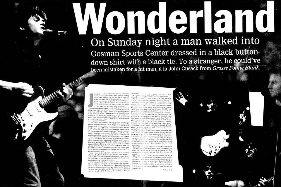 Clipping from The Justice featuring coverage and a photo from John Mayer's performance.