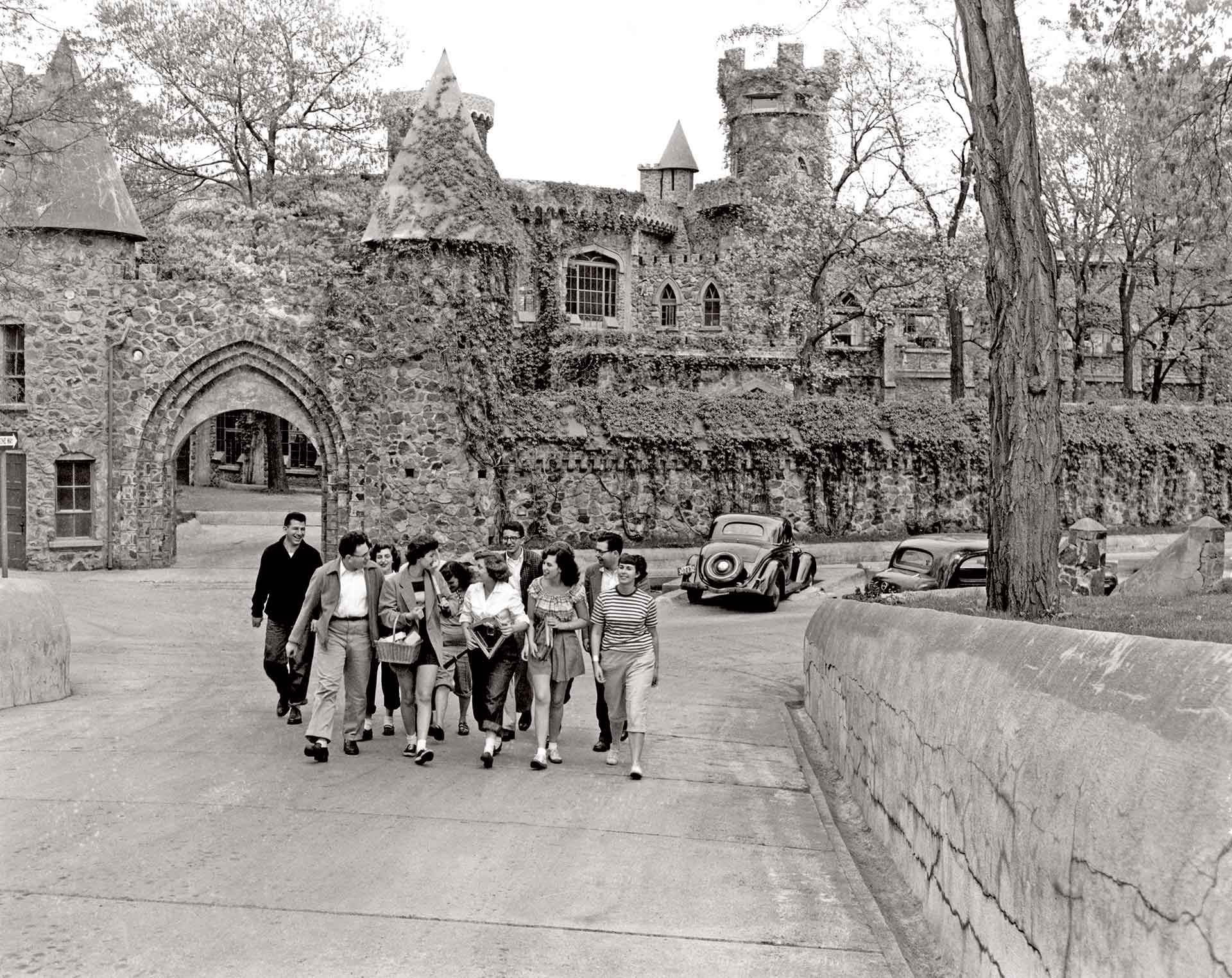 Students walk in front of the Brandeis castle
