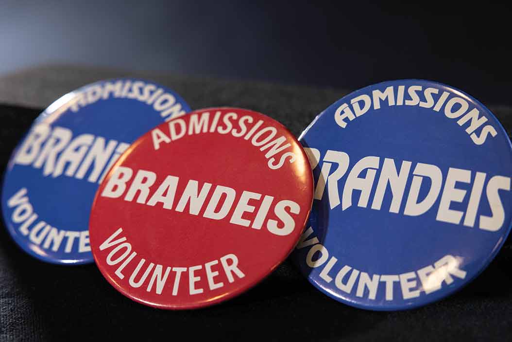 Three buttons — two blue and one red — that read "Brandeis Admissions Volunteer."