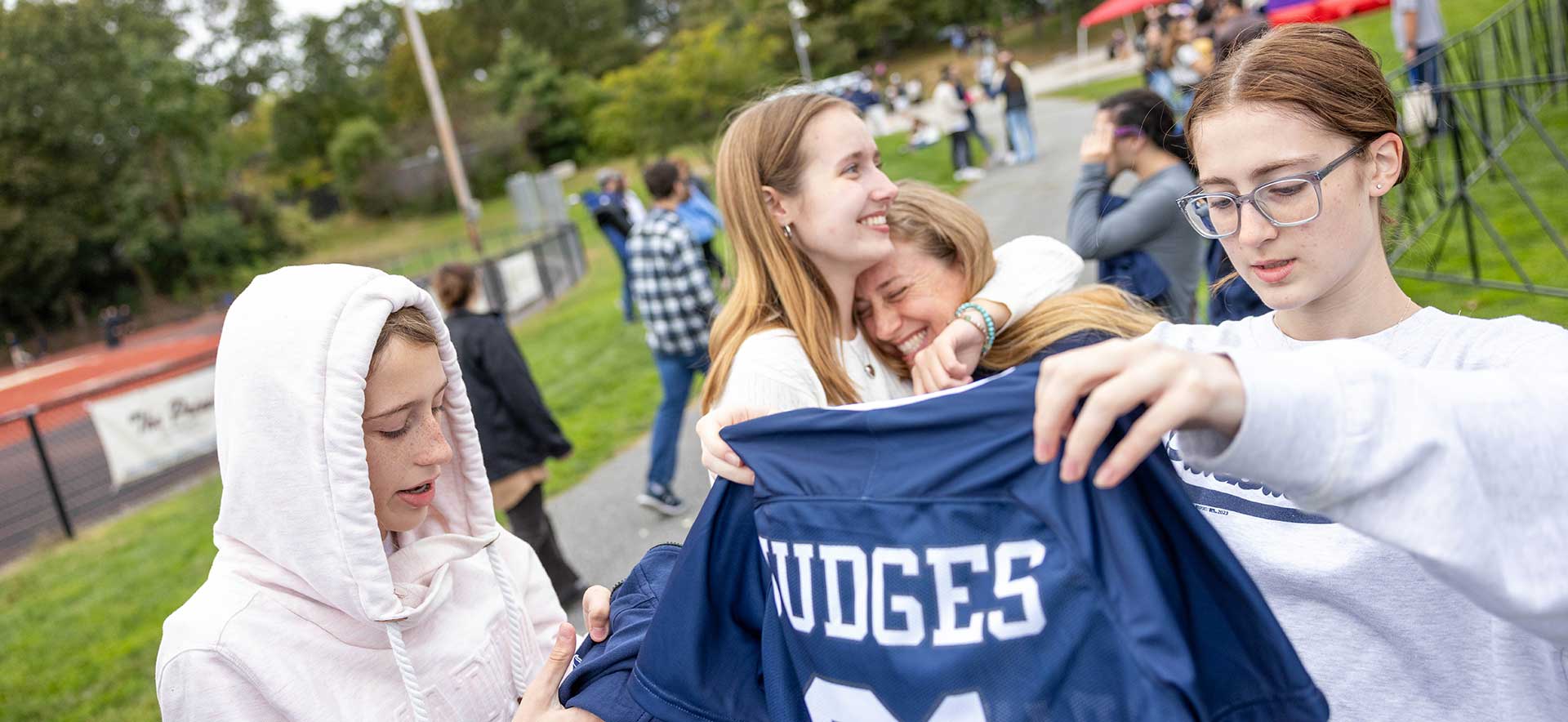 The Jack family looks at Brandeis spirit gear