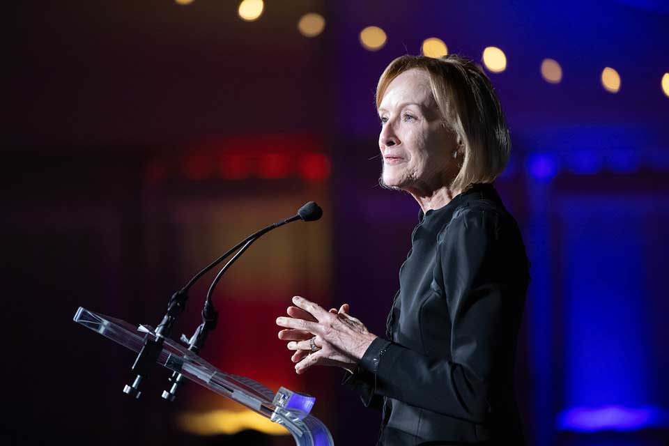 Side profile of Judy Woodruff