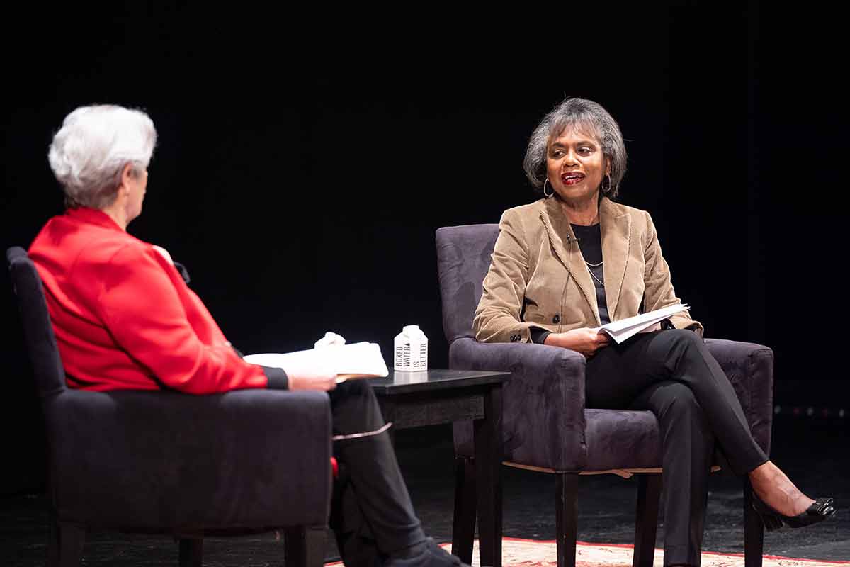 Joyce Antler and Anita Hill speaking on stage