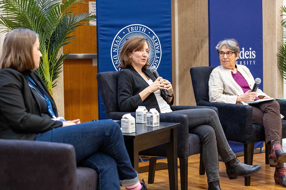 Gabriella Sciolla speaks into a microphone