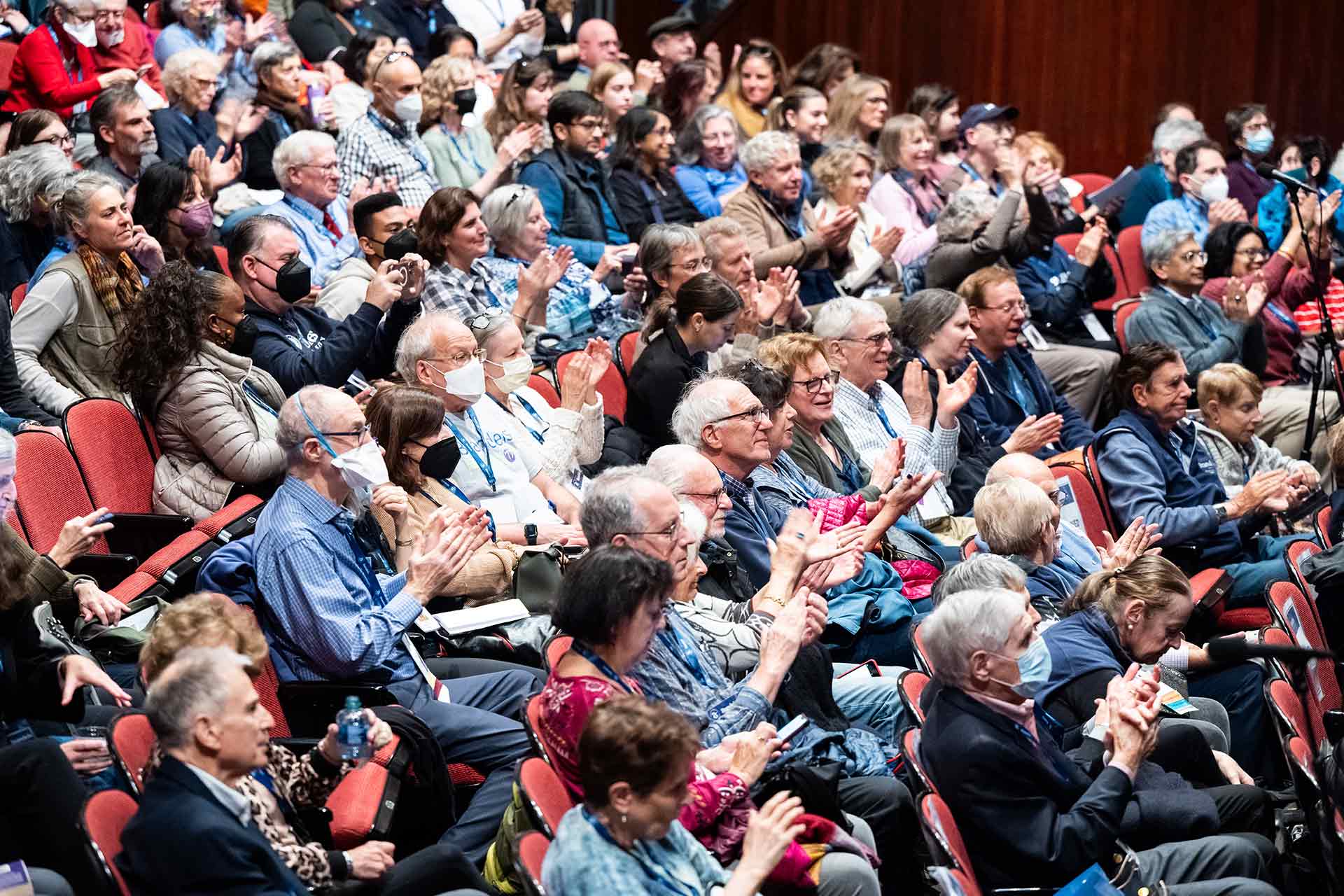 People clapping in the audience