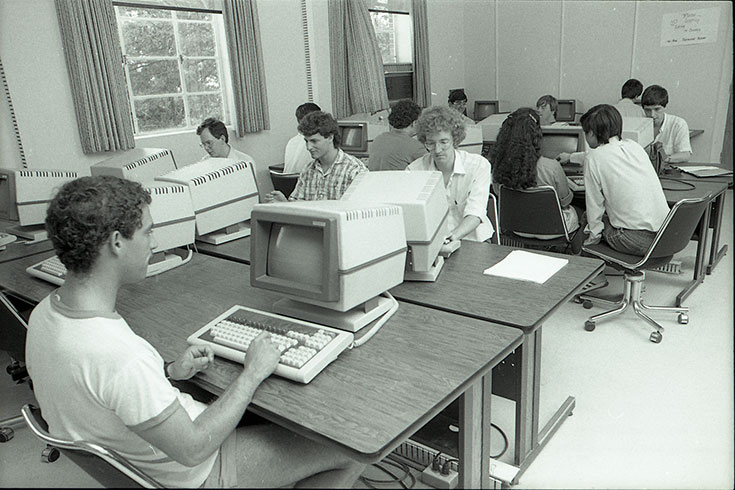 Archival photo of students in a computer lab