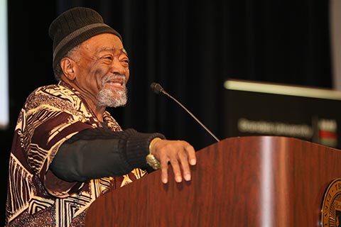 Askia M. Touré speaking from the podium