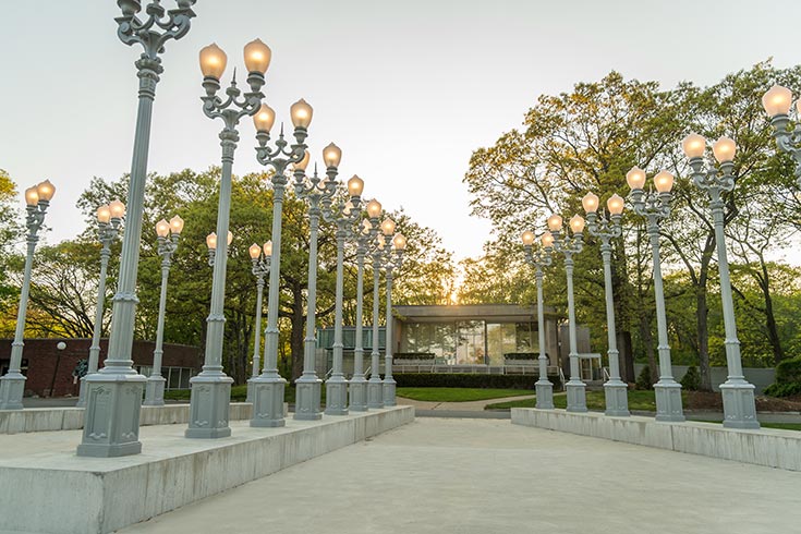 Rose Art Museum in view behind an illuminated "Light of Reason"