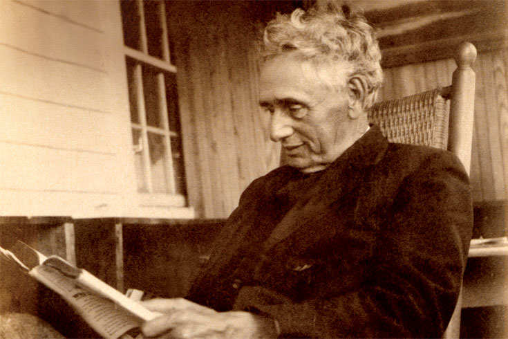 Brandeis reading on his porch, circa 1935