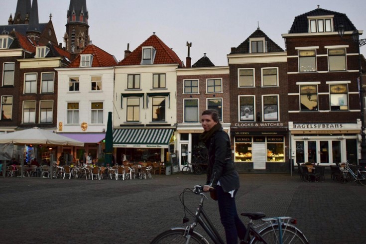 Callahan Cox on a bicycle in Europe