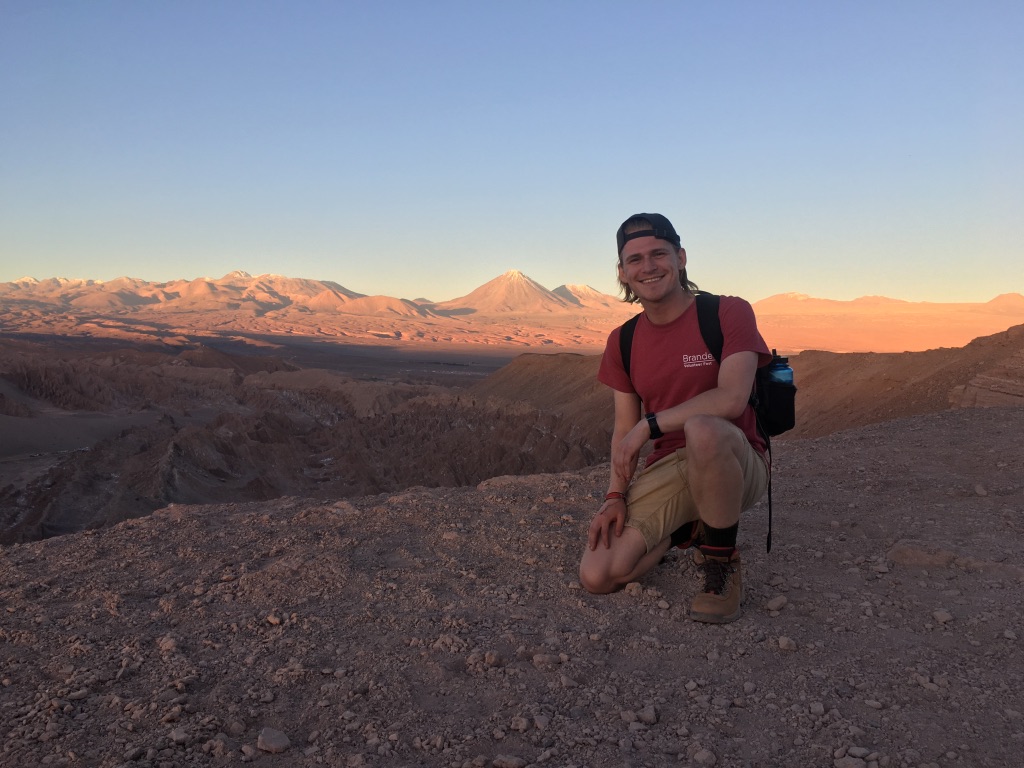Roman hiking on the sandy mountains of Chile.