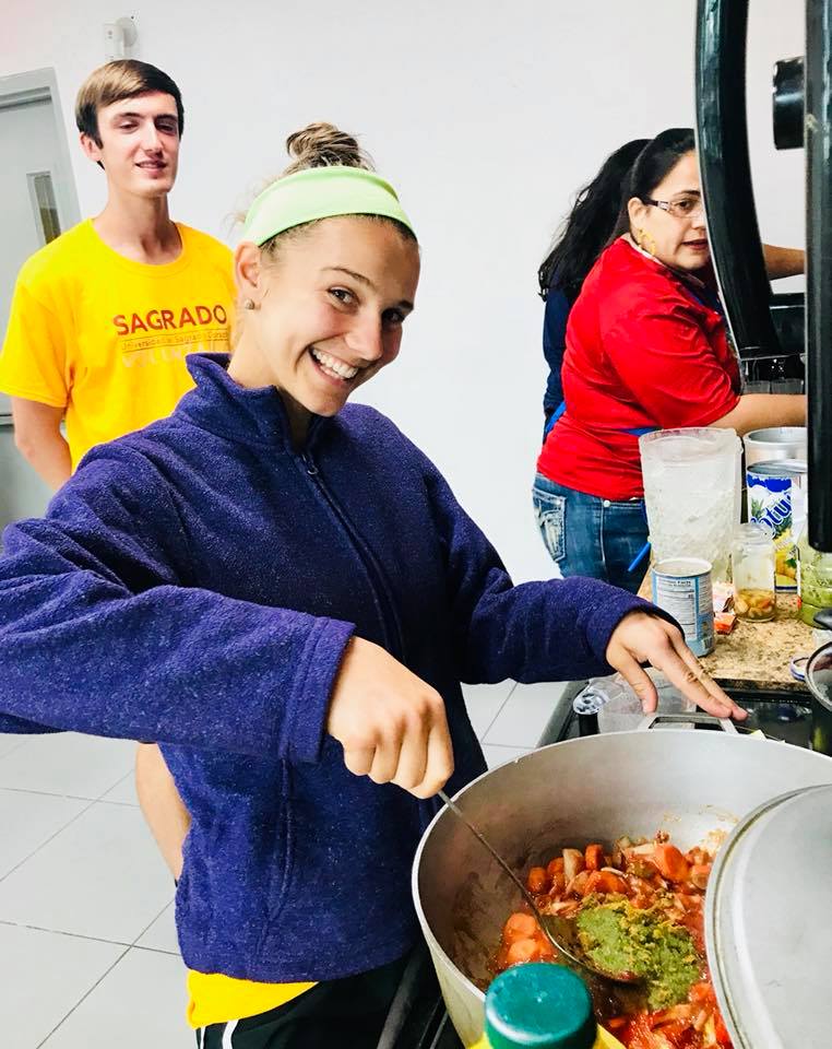 student making dinner