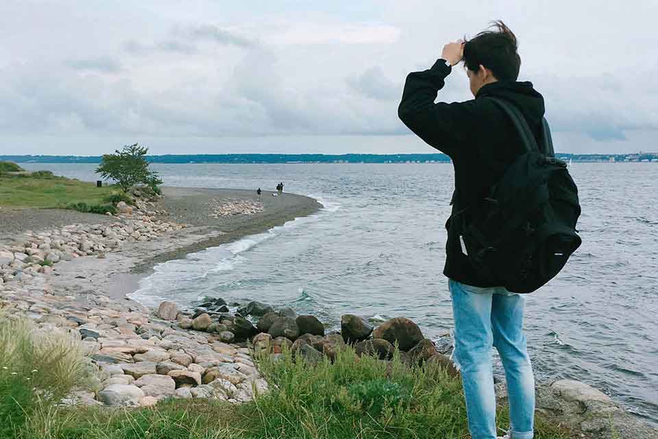 Joon Seok on the ocean in Denmark