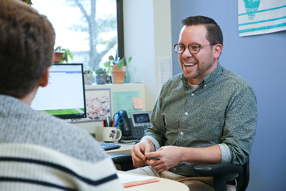 A student meets with an academic adviser