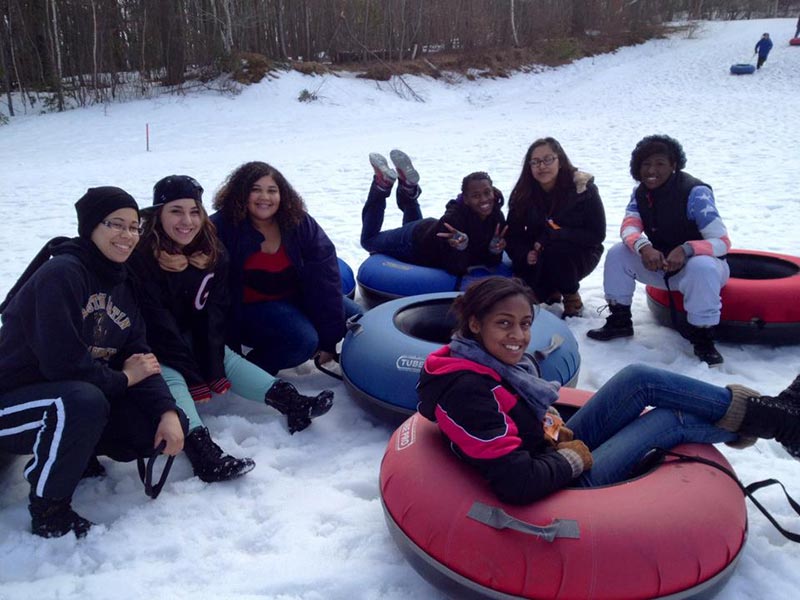Students snow tubing