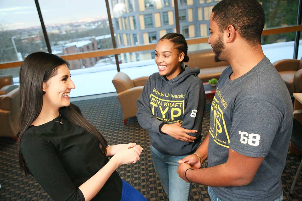 Students meeting in the academic services lobby