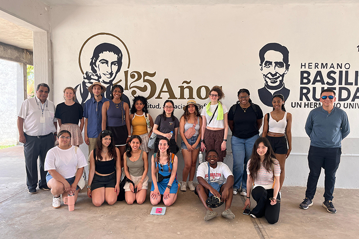 Brandeis students in front of a scenic view in Merida, Mexico