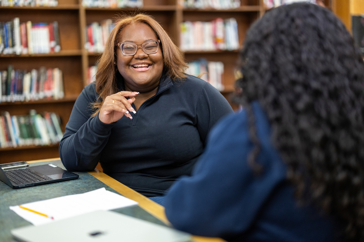 Brianna '26 works with a student in Waltham