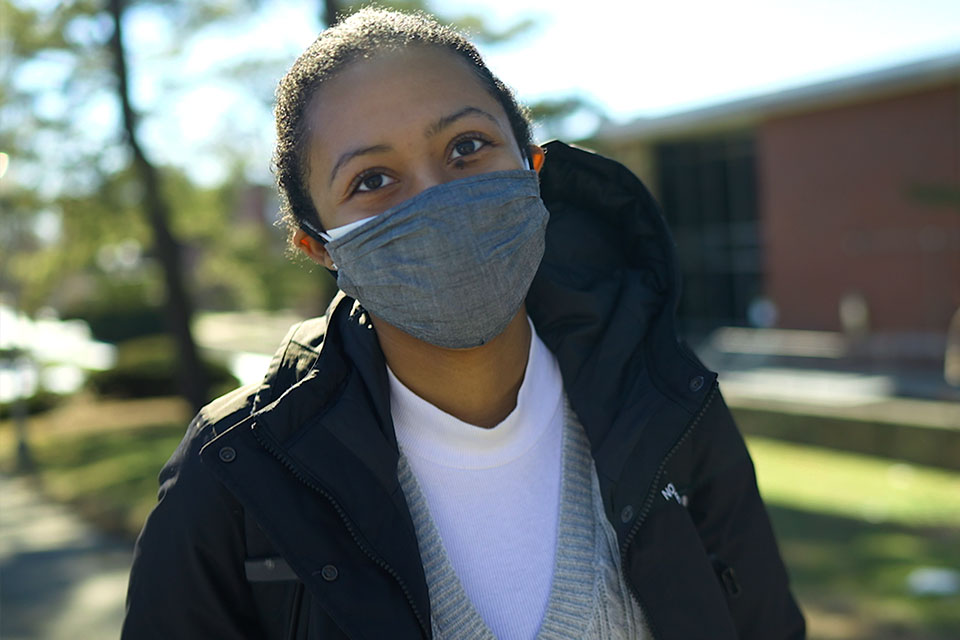 Marissa outside in a mask