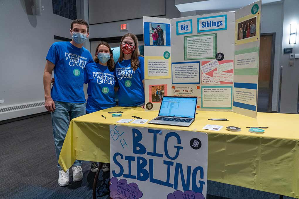 Students outside learning about campus involvement