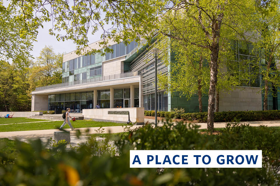 Shapiro Campus Center on a sunny spring day with overlay text that reads "A Place To Grow."