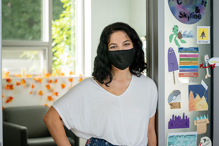 Student in residence hall wearing mask