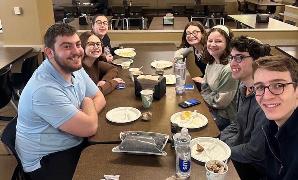 Group of students having breakfast