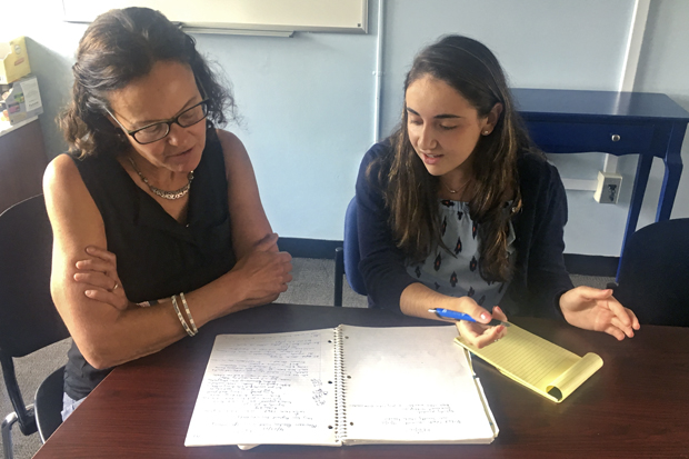 Anthropology professor Sarah Lamb reviews research notes with Gianna Petrillo